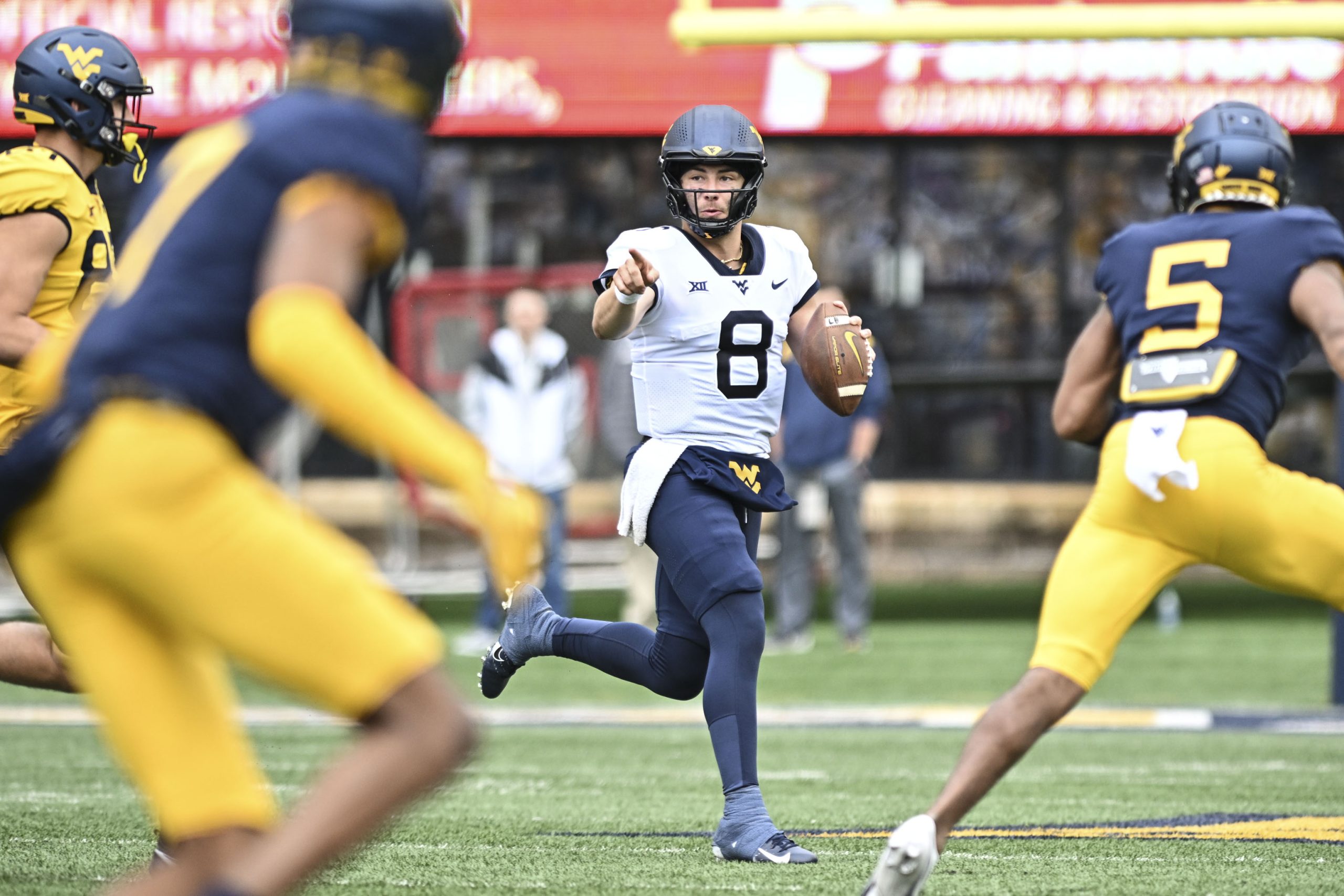 WVU's quarterback battle isn't over yet, but Greene and Marchiol are getting to where they're supposed to be